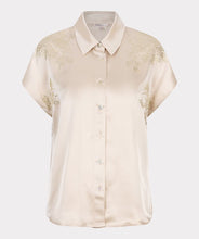 Load image into Gallery viewer, Add instant shine to your wardrobe with this radiant button-down blouse by EsQualo. Designed in a champagne hue with allover micro-sequin embellishment, the Signe Blouse features a relaxed batwing sleeve, classic shirt collar, and button-down silhouette that’s both polished and playful. Whether you’re styling it open over a tank or buttoned up with high-rise trousers, this versatile piece brings a modern twist to glamour.