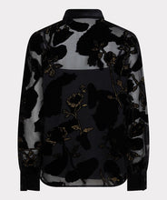 Load image into Gallery viewer, A sheer black blouse with black velour floral pattern and gold lurex threading against a white background.