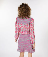 Load image into Gallery viewer, Our Macy multi print blouse is a lovely combination of jade green and pink abstract floral patterns. Lovely and unique, you will stand out in a crowd when you wear this beauty. Easily pairs with denim and skirts and can be dressed up or worn casually. Style with our FALLON FLAIR JEAN IN JADE COLOR- ESQUALO for the perfect colorful look! Colors- Pinks and jade green. Button down. Abstract floral print. Lightweight, slightly sheer. Fabric-100% Viscose.