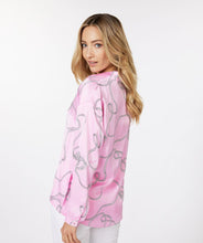 Load image into Gallery viewer, This perfect pink blouse in a satin feel with polo collar and "rope" print is striking in design. A beautiful top to dress up or wear casually, this blouse will definitely receive compliments. Color- Pink, white, black. Long sleeves. One button sleeve closure. Wide fit. Polo collar design. Rope print. Pullover. Satin feel.