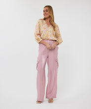 Load image into Gallery viewer, Sunshine meets subtle gold shimmer in the Sella Solar Blouse by EsQualo. Designed with a fluid silhouette and lightweight drape, this relaxed top brings summer ease to any wardrobe. A soft geometric-inspired print gives the look an artful finish, while the breathable fabric makes it perfect for styling from brunch to beach strolls.