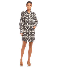 Load image into Gallery viewer, Step into timeless elegance with the Bryce Blouson Sleeve Linen Shirtdress by Karen Kane. Showcasing a delicate sea shell print, this dress is crafted from lightweight and breathable 100% linen, making it a perfect choice for warmer seasons. The sophisticated blouson sleeves add a refined flair, while the silver shank buttons bring a polished, modern detail. Designed with a relaxed fit, this versatile shirtdress transitions seamlessly from casual outings to more formal occasions.
