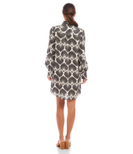 Load image into Gallery viewer, Step into timeless elegance with the Bryce Blouson Sleeve Linen Shirtdress by Karen Kane. Showcasing a delicate sea shell print, this dress is crafted from lightweight and breathable 100% linen, making it a perfect choice for warmer seasons. The sophisticated blouson sleeves add a refined flair, while the silver shank buttons bring a polished, modern detail. Designed with a relaxed fit, this versatile shirtdress transitions seamlessly from casual outings to more formal occasions.