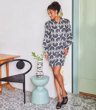 Load image into Gallery viewer, Step into timeless elegance with the Bryce Blouson Sleeve Linen Shirtdress by Karen Kane. Showcasing a delicate sea shell print, this dress is crafted from lightweight and breathable 100% linen, making it a perfect choice for warmer seasons. The sophisticated blouson sleeves add a refined flair, while the silver shank buttons bring a polished, modern detail. Designed with a relaxed fit, this versatile shirtdress transitions seamlessly from casual outings to more formal occasions.