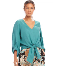 Load image into Gallery viewer, Stay cool and chic with the Bobbi Blouson Sleeve Linen Tie-Front Top in Aqua. Made from 100% lightweight linen, this top exudes effortless elegance. The airy blouson sleeves lend a graceful touch, while the tie-front detail allows for a flattering, adjustable fit. Its vibrant aqua color adds a refreshing and lively charm, making it a perfect choice for warmer days.