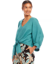 Load image into Gallery viewer, Stay cool and chic with the Bobbi Blouson Sleeve Linen Tie-Front Top in Aqua. Made from 100% lightweight linen, this top exudes effortless elegance. The airy blouson sleeves lend a graceful touch, while the tie-front detail allows for a flattering, adjustable fit. Its vibrant aqua color adds a refreshing and lively charm, making it a perfect choice for warmer days.