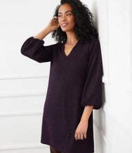 Load image into Gallery viewer, Woman wearing a dark purple and metallic dress against a white background.