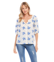 Load image into Gallery viewer, Lightweight cotton gives a breezy quality to this peasant top detailed with charming floral embroidery. It's finished with statement-making puff sleeves. Colors- Off white and blue. Short sleeve. Button down. Floral embroidery.