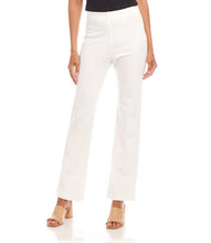 Load image into Gallery viewer, Model wearing off-white pants, black top and tan heeled sandals against a white background.
