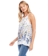 Load image into Gallery viewer, Brighten your wardrobe with the Karen Kane Bria Border Print Top. This sleeveless design, featuring a lovely floral print and shirred neckline, pairs elegance with comfort for any occasion. Crafted from lightweight, fluid crepe fabric, it’s perfect for layering or as a standalone piece.