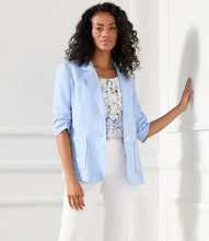Load image into Gallery viewer, Brighten your wardrobe with the Karen Kane Bria Border Print Top. This sleeveless design, featuring a lovely floral print and shirred neckline, pairs elegance with comfort for any occasion. Crafted from lightweight, fluid crepe fabric, it’s perfect for layering or as a standalone piece.