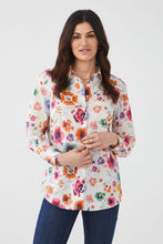 Load image into Gallery viewer, This vibrant top is a must-have for the upcoming seasons of spring and summer. Featuring a bold floral print set against a crisp white background, this long sleeve shirt can be dressed up or down with ease. Simply tie it at the waist and pair with shorts for a casual look or elevate an outfit by pairing with trousers for a standout office ensemble.