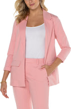 Load image into Gallery viewer, A classic piece, boyfriend blazers are always in style. Now, you can own a boyfriend blazer in a fabulous pastel pink color! Sleek and sophisticated, this gorgeous blazer is incredibly versatile as a part of a suit or matched with your favorite denim. Be prepared to receive compliments when you wear this beauty! Color - Pink perfection. Princess dart styling. Two front flap pockets. Sleek modern style and a relaxed fit. Fabric -54% Rayon. 35% Nylon. 11% Spandex.