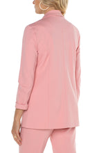 Load image into Gallery viewer, A classic piece, boyfriend blazers are always in style. Now, you can own a boyfriend blazer in a fabulous pastel pink color! Sleek and sophisticated, this gorgeous blazer is incredibly versatile as a part of a suit or matched with your favorite denim. Be prepared to receive compliments when you wear this beauty! Color - Pink perfection. Princess dart styling. Two front flap pockets. Sleek modern style and a relaxed fit. Fabric -54% Rayon. 35% Nylon. 11% Spandex.