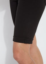 Load image into Gallery viewer, The Lyssé Boyfriend Short is a stylish and comfortable denim short designed for a relaxed yet polished look. Crafted with Lyssé Fit 360° Smoothing technology, these shorts offer 4-way stretch for ultimate flexibility and comfort. The concealed patented waistband ensures a flattering fit, while the slightly relaxed thigh provides ease of movement.