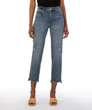 Load image into Gallery viewer, Crafted from comfortable, stretchy denim with subtle distressing, these high-rise jeans are tapered and cropped to replicate the iconic '90s aesthetic. Perfect for any occasion, these jeans offer a versatile wash and timeless style. Color: Built with medium base wash. True to size fit. High rise. Inseam- 26 inch. Perfect stretch. Slight distressing. Frayed hem. Functional front and back pockets.