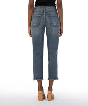 Load image into Gallery viewer, Crafted from comfortable, stretchy denim with subtle distressing, these high-rise jeans are tapered and cropped to replicate the iconic '90s aesthetic. Perfect for any occasion, these jeans offer a versatile wash and timeless style. Color: Built with medium base wash. True to size fit. High rise. Inseam- 26 inch. Perfect stretch. Slight distressing. Frayed hem. Functional front and back pockets.