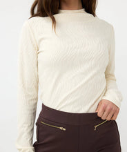Load image into Gallery viewer, Our Blenda turtleneck is an exquisite piece featuring a delicate burnout animal print. Elegantly draped from the shoulder to the waist, it serves as a sophisticated foundation over slacks or chic skirts. 