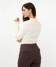 Load image into Gallery viewer, Our Blenda turtleneck is an exquisite piece featuring a delicate burnout animal print. Elegantly draped from the shoulder to the waist, it serves as a sophisticated foundation over slacks or chic skirts. 