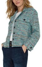 Load image into Gallery viewer, This bouclé knit boxy shacket showcases a stunning blend of oceanic colors. The combination of textures, along with the blue and gold lurex-flecked tones, creates a distinctive and adaptable piece that you'll find yourself reaching for time and time again.