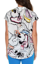 Load image into Gallery viewer, This elegant button-front blouse boasts a stylish dolman sleeve design, complete with a classic collar. Its eye-catching print adds a touch of charm, making it a versatile choice for pairing with denim or dress pants for a timeless appeal. Color- White, black, Button-front closure. Dolman sleeves. Collared. 27" HPS. Liverpool Exclusive Print.