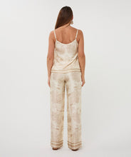 Load image into Gallery viewer, Woman wearing a beige and white safari patterned camisole and matching pant against a white background.