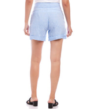 Load image into Gallery viewer, Stay cool and stylish with the Karen Kane Caroline Capri Blue Pleated Shorts, crafted from breathable yarn-dyed linen. Featuring stylized pleats, convenient side pockets, and a chic cuffed hem, these high-waisted shorts offer a polished yet casual look. Perfect for warm days, they pair effortlessly with your favorite tops for versatile styling.
