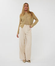 Load image into Gallery viewer, Elevate your wardrobe with the Cira Cardigan Button Lurex by EsQualo. This luxurious gold cardigan features a shimmering lurex fabric, a classic button-front design, and a chic, versatile fit perfect for layering. Whether dressing up or keeping it casual, this stylish knit adds a touch of elegance to any outfit. Shop now for a timeless, fashion-forward look.