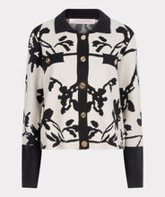 Load image into Gallery viewer, Add a touch of sophistication to your wardrobe with our Short Two-Tone Jacquard Cardigan. This stylish cardigan features a unique two-tone jacquard knit in a floral pattern and includes shiny upscale buttons, creating a chic and elegant look. The round neckline and long sleeves provide a classic silhouette, while the ribbing at the neckline, cuffs, and hem adds a polished finish. Perfect for layering over a simple dress or pairing with jeans for a trendy, effortless style.