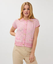 Load image into Gallery viewer, The EsQualo cardigan is a stylish and comfortable option in a delicate pink hue. Its cap sleeves, gold snap buttons, and regular fit make it a versatile choice for layering and adding a touch of sophistication to any outfit. With its soft texture, this cardigan is a must-have for any fashion-forward wardrobe.