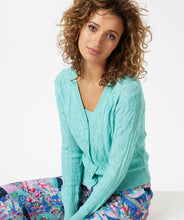 Load image into Gallery viewer, Add a beautiful shade of aqua to your wardrobe with this gorgeous lightweight cable cardigan by EsQualo. A lovely amount of sparkle threading throughout elevates this gorgeous design. A perfect style to wear alone or over a tank or camisole. Our Lark cardigan matches perfectly with our LALEH LUREX SPARKLE ZIGZAG CAMISOLE - ESQUALO. Color - Aqua (Picture appears more blue in color. In person, cardigan has a blue/green hue.) Sparkle metallic threading throughout. Button up front.