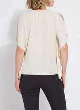 Load image into Gallery viewer, Breezy elegance meets modern versatility in the Carmen "V" Neck Scarf Top by Lysse. Crafted from lightweight Stretch Woven fabric with 2-way stretch, this flowy silhouette is designed to move with you—offering a relaxed fit that flatters without clinging. The unique scarf-inspired construction features two stitched side panels that release at the shoulders, creating graceful drape and dimension with every step.