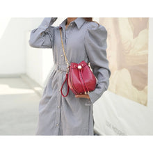 Load image into Gallery viewer, The Cassidy Crocodile Embossed Bag is a stylish and functional shoulder bag designed for women. The bag is made of high-quality animal-friendly vegan leather that is embossed with a crocodile pattern, giving it a unique and fashionable look.