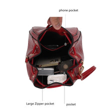 Load image into Gallery viewer, The Cassidy Crocodile Embossed Bag is a stylish and functional shoulder bag designed for women. The bag is made of high-quality animal-friendly vegan leather that is embossed with a crocodile pattern, giving it a unique and fashionable look.