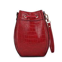 Load image into Gallery viewer, The Cassidy Crocodile Embossed Bag is a stylish and functional shoulder bag designed for women. The bag is made of high-quality animal-friendly vegan leather that is embossed with a crocodile pattern, giving it a unique and fashionable look.