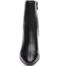 Load image into Gallery viewer, These booties feature an iconic logo on the heel block, adding a striking touch of sophistication. Perfect with casual wide-leg jeans or an elegant dress, they enhance any ensemble with their contemporary style and streamlined design.