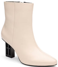 Load image into Gallery viewer, These booties feature an iconic logo on the heel block, adding a striking touch of sophistication. Perfect with casual wide-leg jeans or an elegant dress, they enhance any ensemble with their contemporary style and streamlined design.