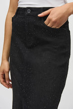 Load image into Gallery viewer, Dazzle and glisten in our Cybele Classic Denim Pencil Skirt with Rhinestones designed by Joseph Ribkoff. Elevate your daily attire with this iconic denim skirt, showcasing a captivating front slit, 5-pocket design, and intricate all-over sparkling embellishments.