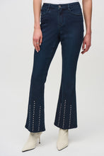 Load image into Gallery viewer, Effortlessly elevate any ensemble with these timeless Cosima Classic Flared Denim Pants by Joseph Ribkoff. These fabulous denim pants feature dazzling rhinestone rivets along the front leg. Perfect for both casual outings and nights on the town, these enduring pants add an edgy touch and versatile flair.