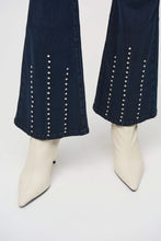 Load image into Gallery viewer, Effortlessly elevate any ensemble with these timeless Cosima Classic Flared Denim Pants by Joseph Ribkoff. These fabulous denim pants feature dazzling rhinestone rivets along the front leg. Perfect for both casual outings and nights on the town, these enduring pants add an edgy touch and versatile flair.