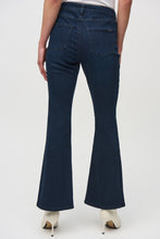 Load image into Gallery viewer, Effortlessly elevate any ensemble with these timeless Cosima Classic Flared Denim Pants by Joseph Ribkoff. These fabulous denim pants feature dazzling rhinestone rivets along the front leg. Perfect for both casual outings and nights on the town, these enduring pants add an edgy touch and versatile flair.