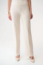 Load image into Gallery viewer, Model wearing a gold chunky bracelet, off-white pull on wide leg pants and off-white heels against a white background.