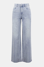Load image into Gallery viewer, Upgrade your denim collection with the Joseph Ribkoff Coralie Classic Wide Leg Stretch Jeans, a stunning fusion of sophistication, comfort, and sustainability. Designed for the modern woman who craves effortless style, these eco-friendly Repreve® stretch denim jeans provide a flattering wide-leg silhouette adorned with dazzling crystal embellishments for that extra touch of glamour.