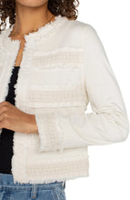 Load image into Gallery viewer, The Collarless Jacket with Fray and Lace in Bone by Liverpool Los Angeles exudes an air of chic elegance. It effortlessly blends traditional tailoring with contemporary elements, making it a standout in any wardrobe. With its versatility, this jacket is perfect for both formal occasions and adding a touch of style to a casual outfit.