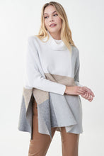 Load image into Gallery viewer, Experience a perfect balance of fashion and comfort in this Joseph Ribkoff tunic sweater. Crafted with an easy-fit silhouette and a contemporary color-blocked design, it's an ideal addition to your everyday wardrobe. Beautifully pairs with our Natalia Nutmeg Faux Leather Pants - Joseph Ribkoff 223196 as pictured. Color- Tan, grey, white. Turtleneck. Colorblock. No pockets. Fabric-48% Rayon. 30% Polyester. 22% Nylon.