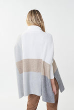 Load image into Gallery viewer, Experience a perfect balance of fashion and comfort in this Joseph Ribkoff tunic sweater. Crafted with an easy-fit silhouette and a contemporary color-blocked design, it's an ideal addition to your everyday wardrobe. Beautifully pairs with our Natalia Nutmeg Faux Leather Pants - Joseph Ribkoff 223196 as pictured. Color- Tan, grey, white. Turtleneck. Colorblock. No pockets. Fabric-48% Rayon. 30% Polyester. 22% Nylon.