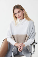 Load image into Gallery viewer, Experience a perfect balance of fashion and comfort in this Joseph Ribkoff tunic sweater. Crafted with an easy-fit silhouette and a contemporary color-blocked design, it's an ideal addition to your everyday wardrobe. Beautifully pairs with our Natalia Nutmeg Faux Leather Pants - Joseph Ribkoff 223196 as pictured. Color- Tan, grey, white. Turtleneck. Colorblock. No pockets. Fabric-48% Rayon. 30% Polyester. 22% Nylon.