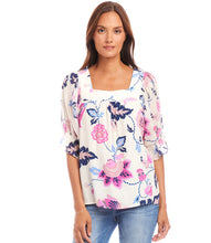 Load image into Gallery viewer, The Corrine Contrast Square Neck Top by Karen Kane is a stylish and versatile piece designed for effortless elegance. Featuring a square neckline and puff sleeves, this top is crafted from 100% viscose for a soft, breathable feel. The Tea Rose Vine Crepe Print, in striking pinks and blues, adds a touch of romance, making it perfect for both casual and dressy occasions.