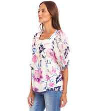 Load image into Gallery viewer, The Corrine Contrast Square Neck Top by Karen Kane is a stylish and versatile piece designed for effortless elegance. Featuring a square neckline and puff sleeves, this top is crafted from 100% viscose for a soft, breathable feel. The Tea Rose Vine Crepe Print, in striking pinks and blues, adds a touch of romance, making it perfect for both casual and dressy occasions.