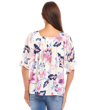 Load image into Gallery viewer, The Corrine Contrast Square Neck Top by Karen Kane is a stylish and versatile piece designed for effortless elegance. Featuring a square neckline and puff sleeves, this top is crafted from 100% viscose for a soft, breathable feel. The Tea Rose Vine Crepe Print, in striking pinks and blues, adds a touch of romance, making it perfect for both casual and dressy occasions.